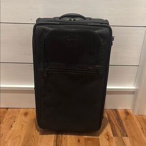Tumi Black Expandable Two Wheeled Roller Suitcase
